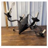 Pierced tin candelabra