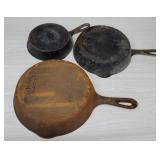 3 cast iron pans - wagner, griswold, and ?