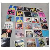 30 records -Elvis, Sinatra, Johnny cash