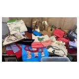 Clear tub of totes, purses & backpacks - most