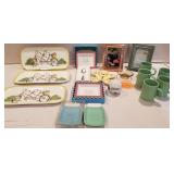 Picture frames, coffee cups, small tray, spoon