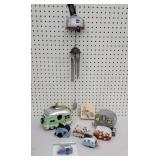 Campers, birdhouse, wind chimes, bank, and