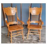 Pair pressed back oak arm chairs