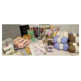 17 rolls of yarn, crochet hooks, wooden yarn