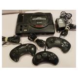 Sega Genesis game system with paddles