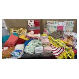 Big box of new kitchen towels, placemats,