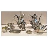 Silver serving pieces, coffee pot, pitcher, cup