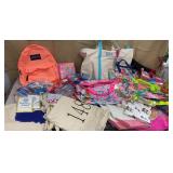 Clear tub of totes, duffel bags, backpacks etc.