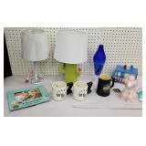 Lamps with shades, coffee cups, cookie jar, dog