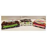 Lot of fabric, flowered, some campers on it,