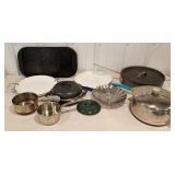 Cast iron griddle, pots and pans, sauce pans, etc