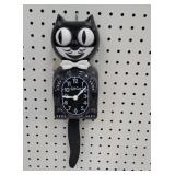 Wag on the wall clock - battery op.