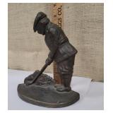 Heavy cast iron golf doorstop