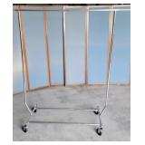 Rolling garments rack