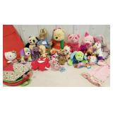 Red tub full of stuffed animals, Ty babies, Pooh,
