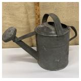 Galvanized watering can