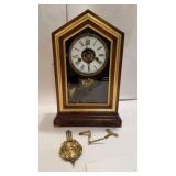 E.Incraham & Co. Clock with key