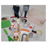 Copper wire basket of new kitchen -  pizza cutter,