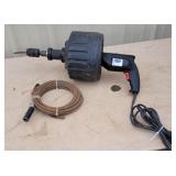 Electric plumbing snake and a manual snake