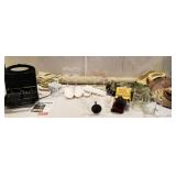 Waffle maker, wine glasses, fabric, hats, gravy