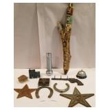 Horse shoes, metal stars, small wooden houses,