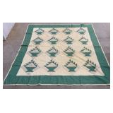 Green & white quilt w/ baskets approx 68"x68" -