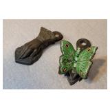 2 cast iron/brass figural clips