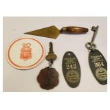 Ithaca hotel keys, coaster, letter opener, etc