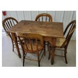 4 collar back chairs ** table item 160