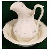 Pitcher and bowl with flowers