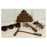 pick tool, iron ant, brass bells, cast iron piece