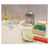 Juice- O- Mat, Pyrex measuring cup,  chopper,