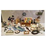 Christmas items, candles, wooden shelf, small