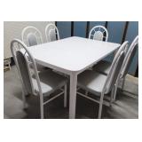 Table, 6 chairs, 1 leaf  opens to 59"42"30