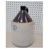 2 gallon brown and white jug