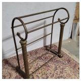 Brass quilt rack