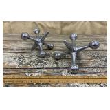 Pair of oversized chrome Jax bookends