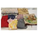 Retro aprons, tablecloths, a tapestry,