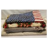 Table runners, thin blanket, a quilted flag, rug,