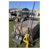 4 rakes and a snow shovel