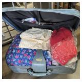 Vintage suitcase, full of fantastic fabric