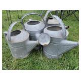 4 galvanized water cans