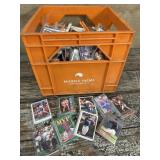 Orange dairy crate full of baseball cards