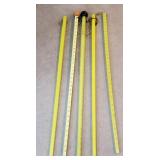 5 walking sticks/yard sticks.