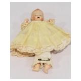 Small vintage doll, needs rubber band on legs, in