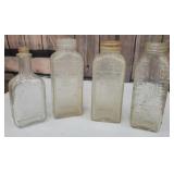 4 really neat Barber bottles