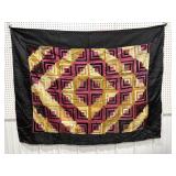 Pretty satin-like quilt approx 49"x65" - a bit