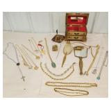 Jewelry box with jewelry, necklaces, crosses,