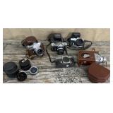 Blue crate of vintage cameras & accessories