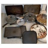 Lot of bakeware, cookie sheets, pizza pans,